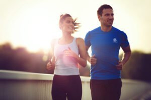 Coach sportif expert en running avec un coach sportif